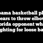 Alabama basketball player appears to throw elbow at Florida opponent while fighting for loose ball