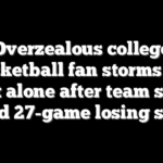 Overzealous college basketball fan storms the court alone after team snaps record 27-game losing streak