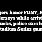 Rangers honor FDNY, NYPD with jerseys while arriving in firetrucks, police cars before Stadium Series game