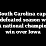South Carolina caps undefeated season with NCAA national championship win over Iowa