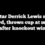 UFC star Derrick Lewis moons crowd, throws cup at media after knockout win