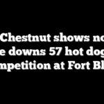 Joey Chestnut shows no rust as he downs 57 hot dogs in competition at Fort Bliss