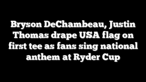 Bryson DeChambeau, Justin Thomas drape USA flag on first tee as fans sing national anthem at Ryder Cup