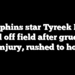 Dolphins star Tyreek Hill carted off field after gruesome knee injury, rushed to hospital