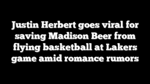 Justin Herbert goes viral for saving Madison Beer from flying basketball at Lakers game amid romance rumors