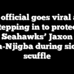 NFL official goes viral after stepping in to protect Seahawks’ Jaxon Smith-Njigba during sideline scuffle