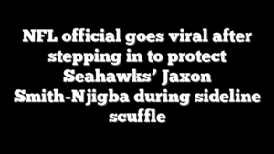 NFL official goes viral after stepping in to protect Seahawks’ Jaxon Smith-Njigba during sideline scuffle