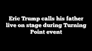 Eric Trump calls his father live on stage during Turning Point event