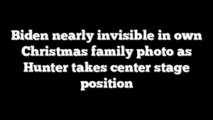 Biden nearly invisible in own Christmas family photo as Hunter takes center stage position