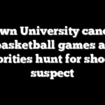 Brown University cancels basketball games as authorities hunt for shooting suspect