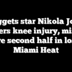 Nuggets star Nikola Jokic suffers knee injury, misses entire second half in loss to Miami Heat