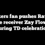 Packers fan pushes Ravens wide receiver Zay Flowers during TD celebration