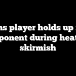 Pistons player holds up fist to opponent during heated skirmish