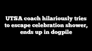 UTSA coach hilariously tries to escape celebration shower, ends up in dogpile