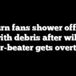 Auburn fans shower officials with debris after wild buzzer-beater gets overturned