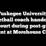 Tuskegee University basketball coach handcuffed on court during post-game incident at Morehouse College
