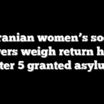 21 Iranian women’s soccer players weigh return home after 5 granted asylum