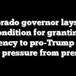 Colorado governor lays out condition for granting clemency to pro-Trump clerk under pressure from president