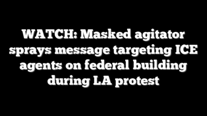 WATCH: Masked agitator sprays message targeting ICE agents on federal building during LA protest