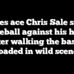 Braves ace Chris Sale slams baseball against his head after walking the bases loaded in wild scene