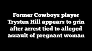 Former Cowboys player Trysten Hill appears to grin after arrest tied to alleged assault of pregnant woman
