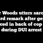 Tiger Woods utters sarcastic 3-word remark after getting placed in back of cop car during DUI arrest