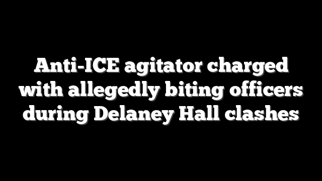 Anti-ICE agitator charged with allegedly biting officers during Delaney Hall clashes