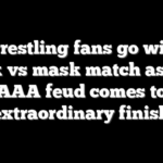 Pro wrestling fans go wild for mask vs mask match as wild AAA feud comes to extraordinary finish