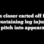 Reds closer carted off field after sustaining leg injury just one pitch into appearance