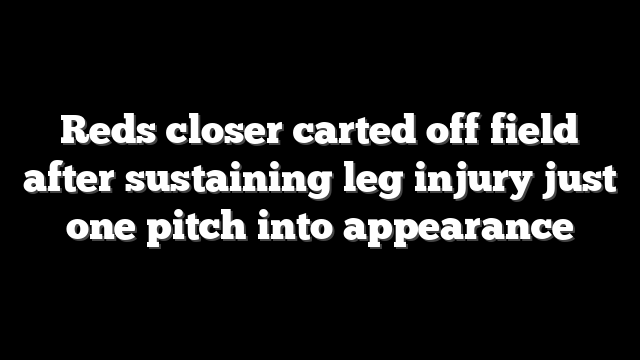Reds closer carted off field after sustaining leg injury just one pitch into appearance