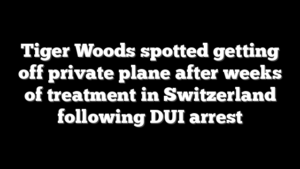 Tiger Woods spotted getting off private plane after weeks of treatment in Switzerland following DUI arrest