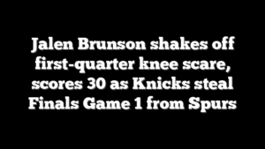 Jalen Brunson shakes off first-quarter knee scare, scores 30 as Knicks steal Finals Game 1 from Spurs