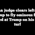 Obama judge clears left-wing group to fly ominous flag aimed at Trump on his own turf