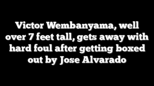 Victor Wembanyama, well over 7 feet tall, gets away with hard foul after getting boxed out by Jose Alvarado