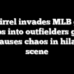 A squirrel invades MLB game, jumps into outfielders glove and causes chaos in hilarious scene