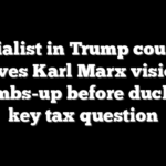 Socialist in Trump country gives Karl Marx vision thumbs-up before ducking key tax question