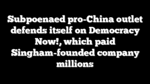 Subpoenaed pro-China outlet defends itself on Democracy Now!, which paid Singham-founded company millions