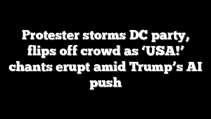 Protester storms DC party, flips off crowd as ‘USA!’ chants erupt amid Trump’s AI push